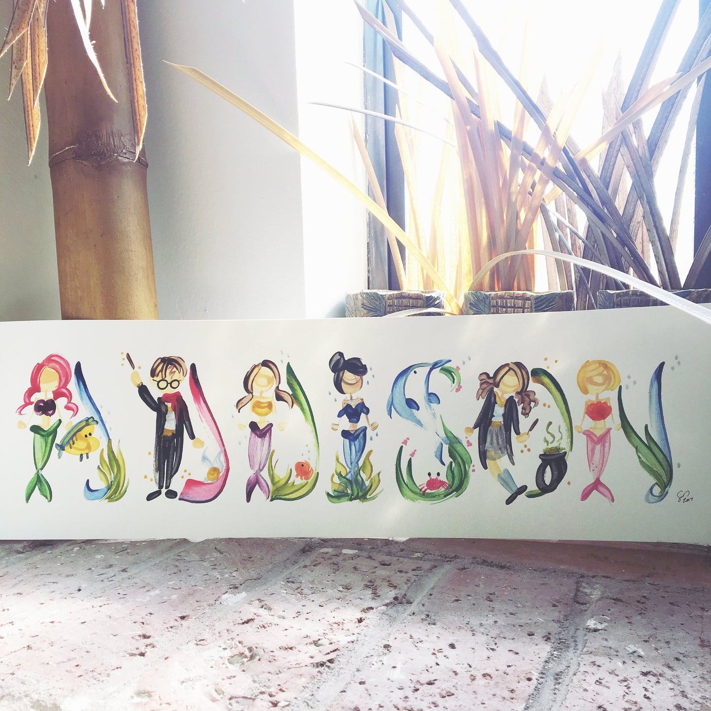 Mix-and-match themed name featuring Mermaids and Wizards with the name "ADDISON"